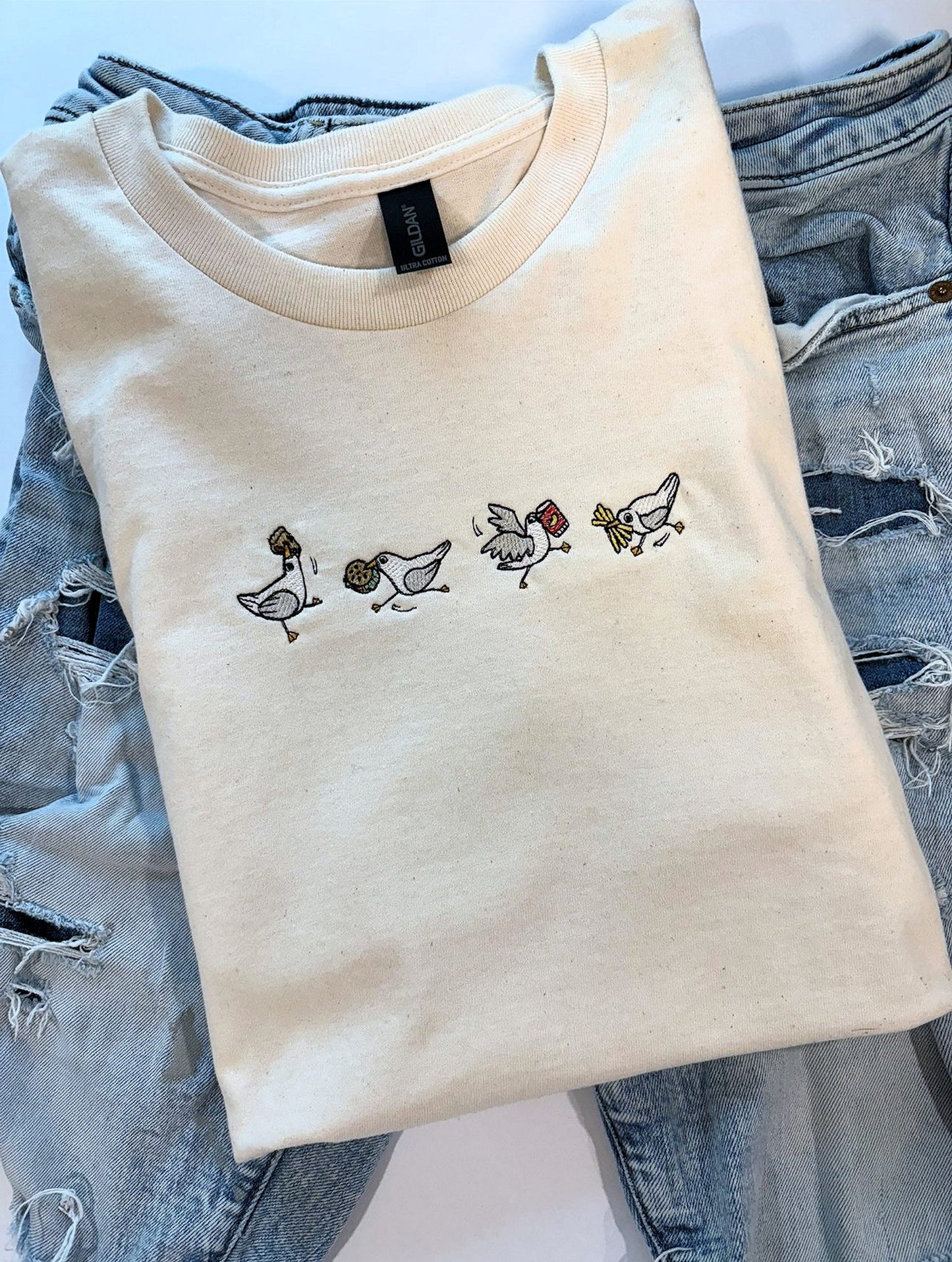 Crazy And Silly Seagulls Embroidered T-Shirt.